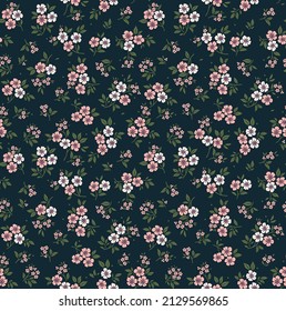 Trendy seamless vector floral pattern. Endless print made of small white and pink flowers. Summer and spring motifs. Dark blue background. Stock vector illustration.