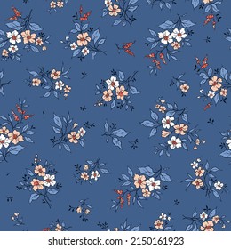 Trendy seamless vector floral pattern. Endless print made of small white and rose flowers. Summer and spring motifs. Blue background. Stock vector illustration.