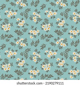 Trendy seamless vector floral pattern. Endless print made of small white flowers. Summer and spring motifs. Pastel blue background. Stock vector illustration.