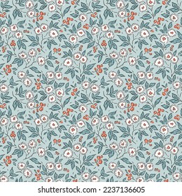 Trendy seamless vector floral pattern. Beautiful print made of small white flowers and orange berries. Summer and spring motifs. Light blue background. Stock vector illustration.