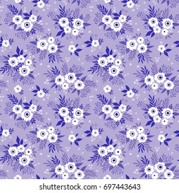 Trendy seamless vector floral pattern. Endless print made of small white flowers and leaves. Summer and spring motifs. Lilac background.Vector illustration.