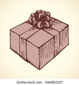 Trendy small parcel tag in wrap cardboard with luxury knot on white backdrop. Freehand outline ink hand drawn xmas giftbox in art retro scribble style pen on paper. View closeup with space for text