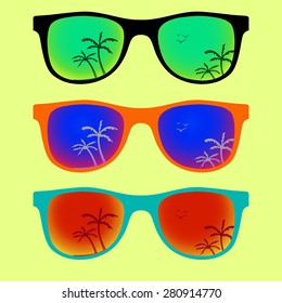 Trendy sunglasses with colorful lens and frame reflect summer palms