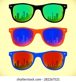 Trendy sunglasses and colorful lens   frame reflect city sky view in summer
