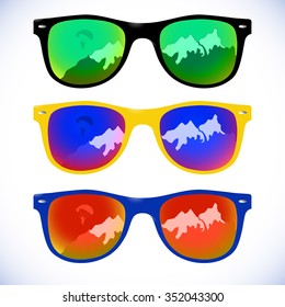 Trendy sunglasses with colorful lens and frame reflect mountains and skydiver parachute, vector illustration