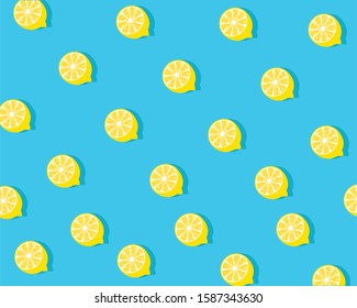 Trendy sunlight Summer pattern made with yellow lemon slice on bright light blue background. Minimal summer concept.