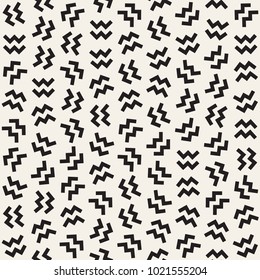 Trendy Texture With Scattered Geometric Shapes.  Inspired by Memphis Design. Abstract Monochrome Background. Vector Seamless Pattern.