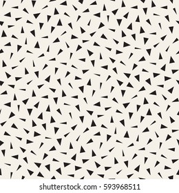 Trendy Texture With Scattered Geometric Shapes.  Inspired by Memphis Design. Abstract Monochrome Background. Vector Seamless Pattern.