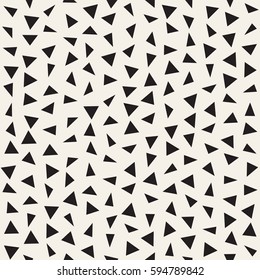 Trendy Texture With Scattered Geometric Shapes.  Inspired by Memphis Design. Abstract Monochrome Background. Vector Seamless Pattern.