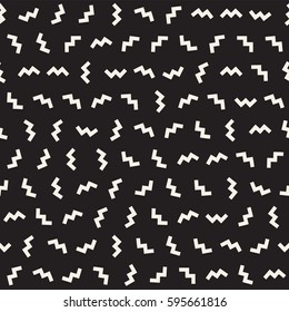 Trendy Texture With Scattered Geometric Shapes.  Inspired by Memphis Design. Abstract Monochrome Background. Vector Seamless Pattern.