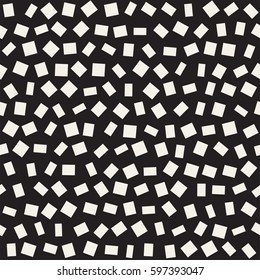 Trendy Texture With Scattered Geometric Shapes.  Inspired by Memphis Design. Abstract Monochrome Background. Vector Seamless Pattern.