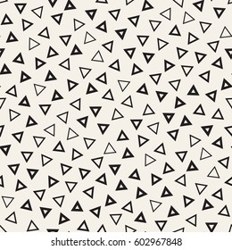 Trendy Texture With Scattered Geometric Shapes.  Inspired by Memphis Design. Abstract Monochrome Background. Vector Seamless Pattern.