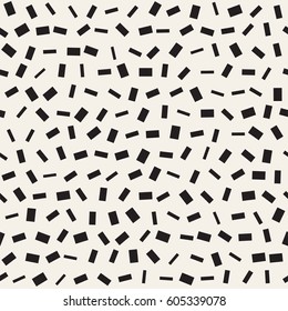 Trendy Texture With Scattered Geometric Shapes.  Inspired by Memphis Design. Abstract Monochrome Background. Vector Seamless Pattern.
