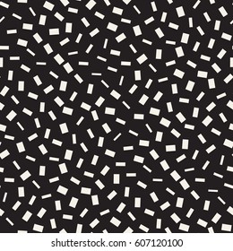 Trendy Texture With Scattered Geometric Shapes. Vector Seamless Pattern.