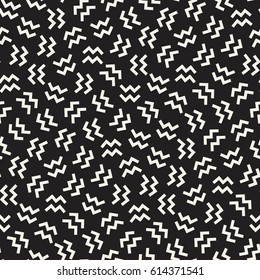 Trendy Texture With Scattered Geometric Shapes. Vector Seamless Pattern.