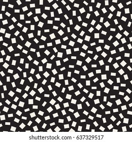 Trendy Texture With Scattered Geometric Shapes.  Inspired by Memphis Design. Abstract Monochrome Background. Vector Seamless Pattern.