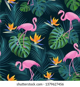 Trendy tropical pattern with flamingos and exotic flowers. Vector seamless texture.