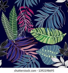 Trendy tropical print with palm leaves. Seamless vector pattern with colorful plants.  Summer textile collection. On black background.