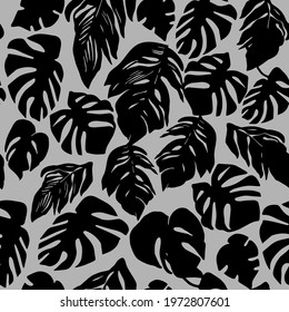 Trendy vector monochrome seamless pattern with silhouettes of black tropical leaves for apparel fabric, trendy package, wallpaper, accessories design , clothe textile, print.
