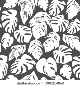 Trendy vector monochrome seamless pattern with silhouettes of tropical leaves on black background. For apparel fabric, trendy package, wallpaper, accessories design , clothe textile, print.