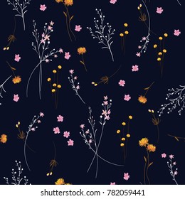 Trendy  wild blowing  Floral pattern in the many kind of flowers. Modern Wild botanical  Seamless vector texture. For fashion prints. Printing with in hand drawn style on navy blue  background.