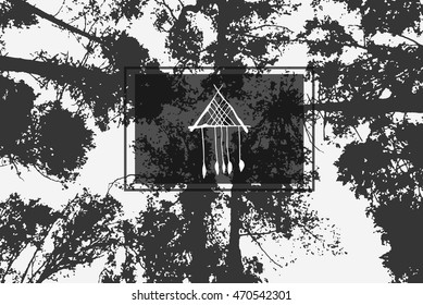 Triangle Dreamcatcher in the hand drawn on the background texture. The tops of the trees above his head.