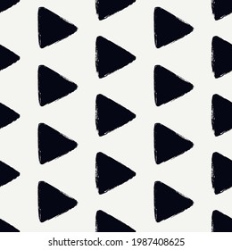 Triangle motif minimal geometric print. Paint brush seamless pattern. Freehand grunge design background. Trendy handdrawn modern simple geo ornament. Artistic hand drawn abstract vector wallpaper