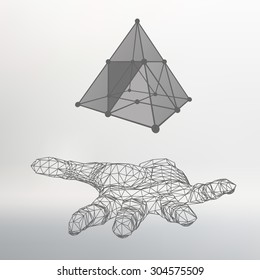 triangle pyramid on the arm. The hand holding a pyramid. Polygon triangle. Polygonal hand. White background. The shadow of the objects in the background.