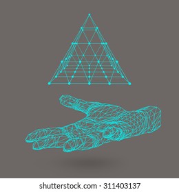 triangle pyramid on the arm. The hand holding a pyramid. Polygon triangle. Polygonal hand. White background. The shadow of the objects in the background.