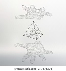 triangle pyramid on the arm. The hand holding a pyramid. Polygon triangle. Polygonal hand