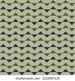 Triangle seamless pattern on mountain green color background. Modern stylish texture. Perfect for wallpaper and fashion print.