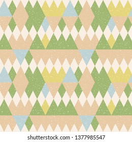 Triangles background. Vector geometric seamless pattern in pastel retro colors and textured simple shapes.