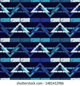 Triangles. Ethnic boho seamless pattern. Lace. Embroidery on fabric. Patchwork texture. Weaving. Traditional ornament. Tribal pattern. Folk motif. Can be used for wallpaper, textile, wrapping, web.
