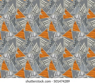 Triangles orange striped with black .Hand drawn with ink seamless background.Creative handmade repainting design for fabric or textile.Geometric pattern with triangles.Vintage retro colors