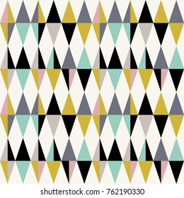 Triangles seamless pattern. Modern vector abstract geometric background with triangles in retro colors. Scandinavian nordic design style.