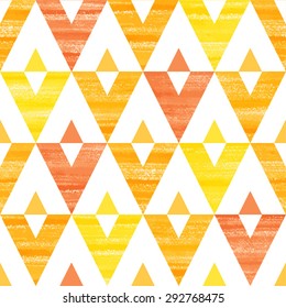 Triangles seamless vector pattern. Yellow, orange and red brush drawn acrylic geometrical background.