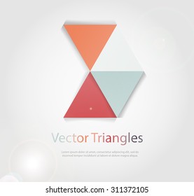 Triangles with shades and colors arranged in colorful pattern. Geometrical pattern with vintage colors. Abstract background texture.