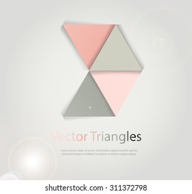 Triangles with shades and colors arranged in colorful pattern. Geometrical pattern with vintage colors. Abstract background texture.