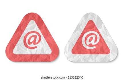 triangles with a texture of crumpled paper and email symbol
