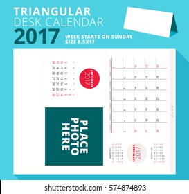 Triangular desk calendar planner for 2017 year. September 2017. Week starts on Sunday. Printable stationery template with place for photo. Vector illustration