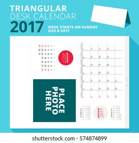 Triangular desk calendar planner for 2017 year. January 2017. Week starts on Sunday. Printable stationery template with place for photo. Vector illustration