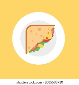 A triangular sandwich lies on a white plate. Snack. Breakfast. Dinner. Lunch at work