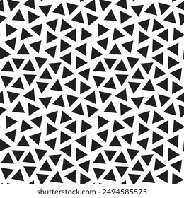 Triangular seamless pattern, a collection of scattered black triangles on a transparent background