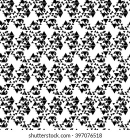 Triangular seamless vector pattern. Abstract black triangles on white background.