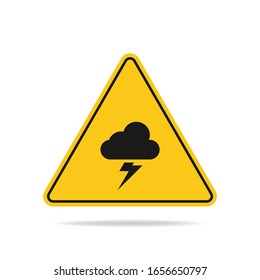 The triangular warning sign of a thunderstorm threat with lightning and cloud symbols is isolated on a white background.