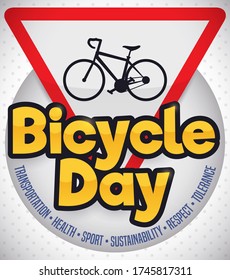 Triangular yield signal with bike silhouette and golden sign over precepts to celebrate Bicycle Day.