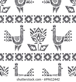 Tribal american indian vector seamless pattern with birds and flowers. Hand drawn ethnic ornamental texture. Abstract geometrical background with mexican motifs