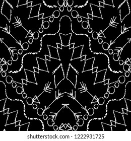 Tribal apache vector seamless pattern. Black and white ornamental ethnic geometric background. Tribe aztec grunge trendy ornament with doodle chalk hand drawn arrows, waves, shapes, rhombus, circles.