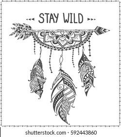 Tribal arrow in ethnical pattern with mandala dream catcher