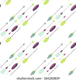 Tribal arrow seamless pattern. Green, mint and purple arrows arranged in diagonal oblique rows.
